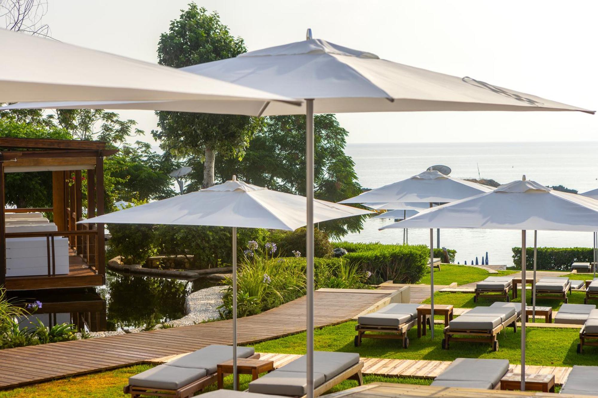 Capo Bay Hotel Protaras Bagian luar foto The beach at the hotel