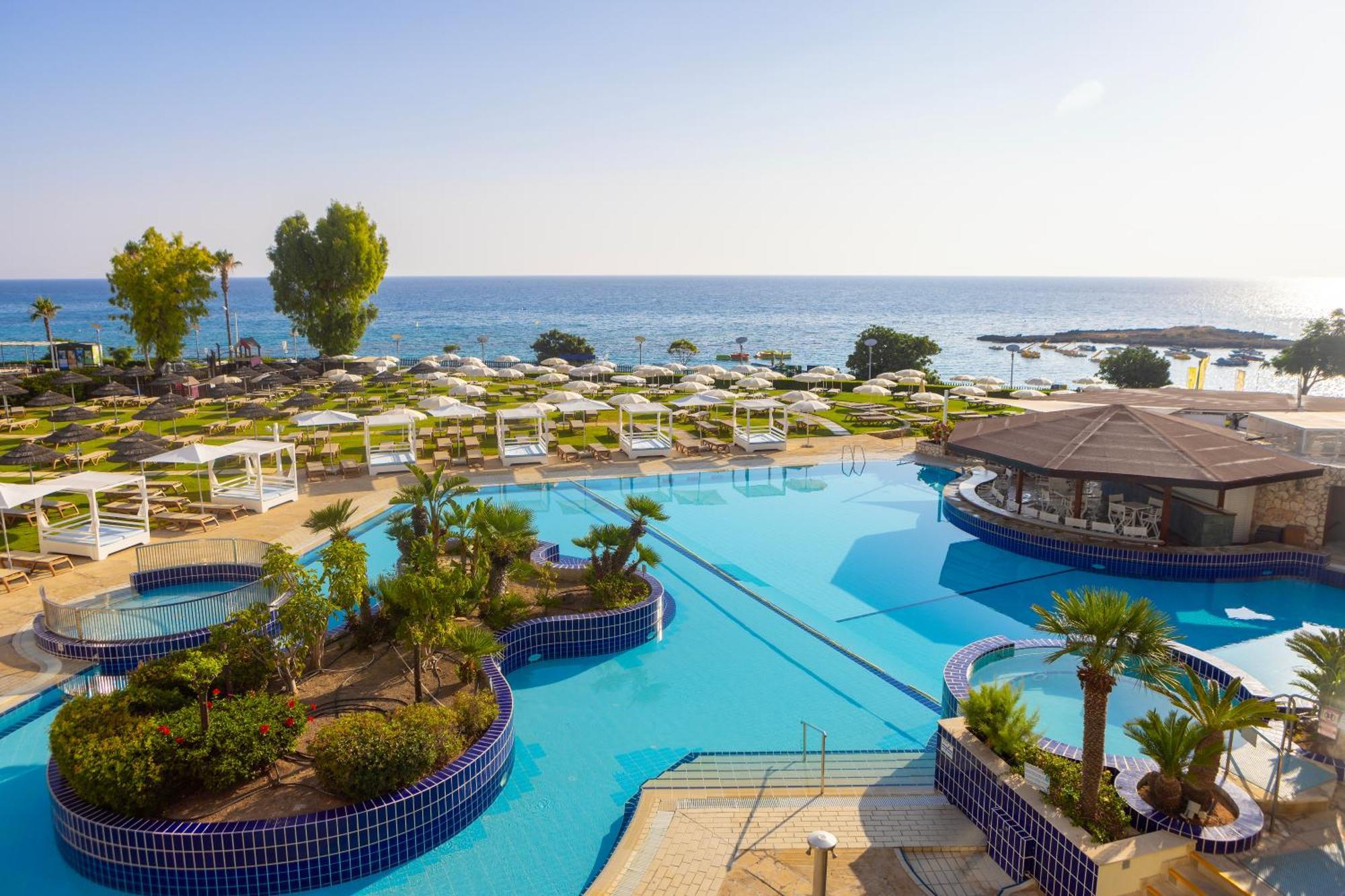 Capo Bay Hotel Protaras Bagian luar foto The resort's swimming pool