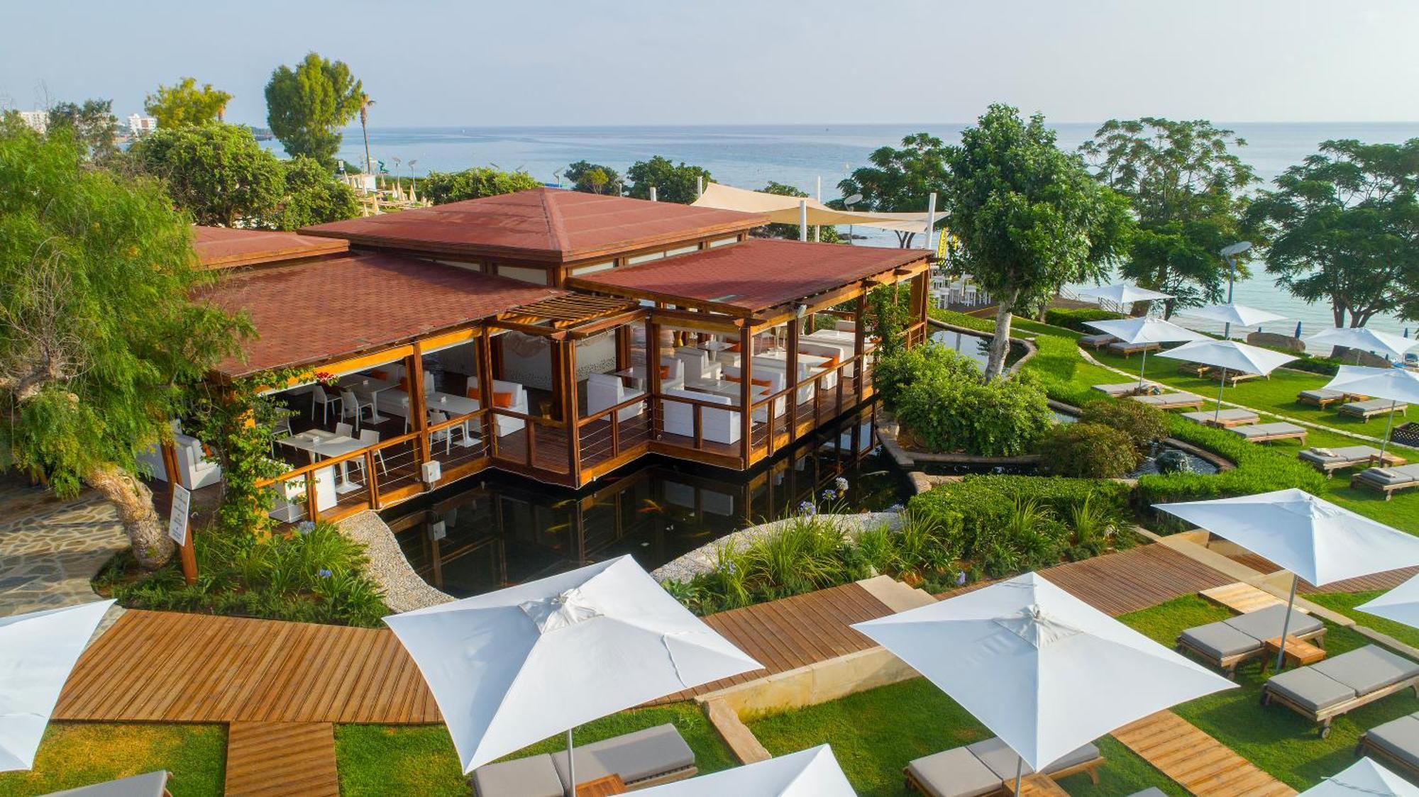 Capo Bay Hotel Protaras Bagian luar foto The resort's main restaurant